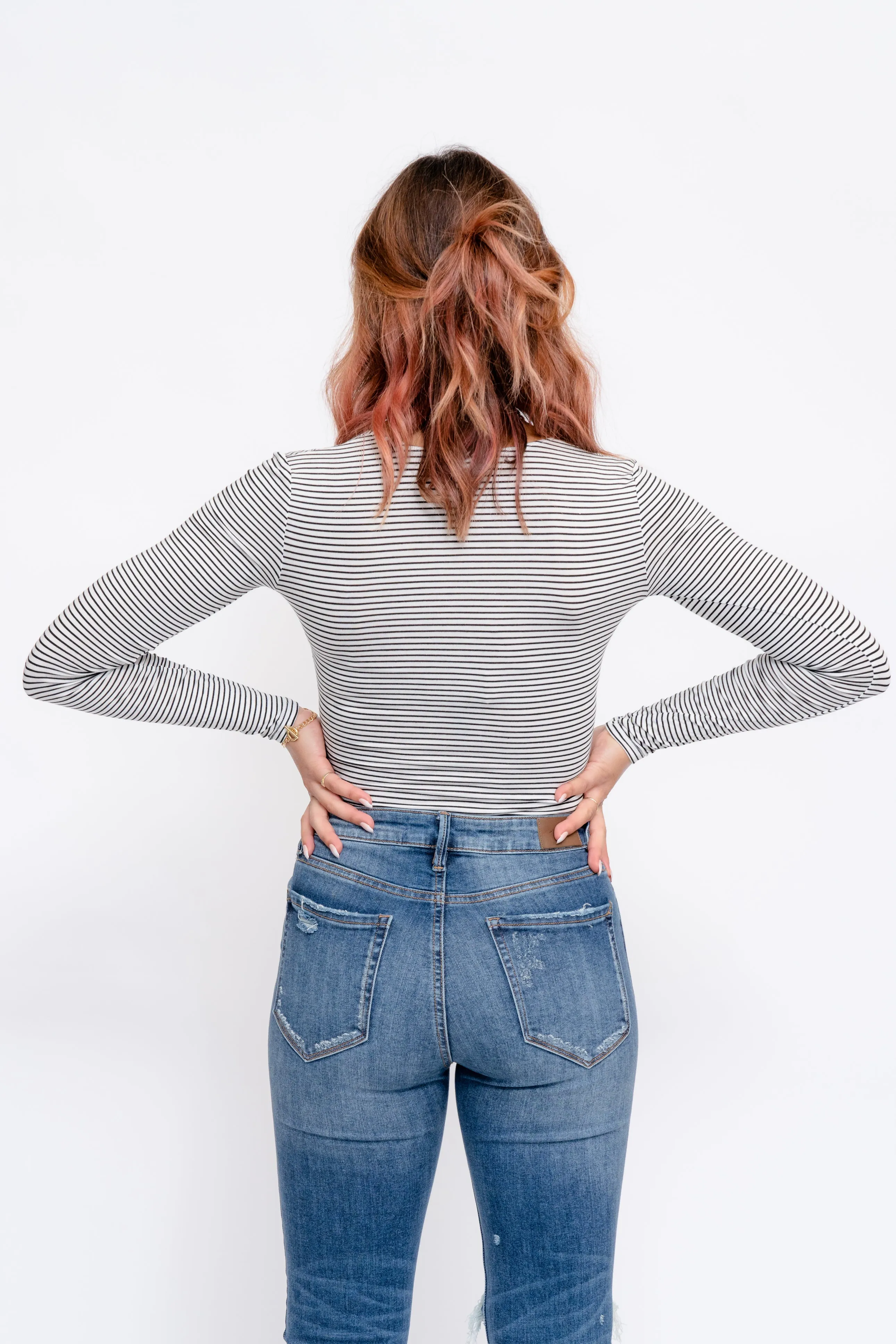 Plot Twist Deep V-Neck Bodysuit